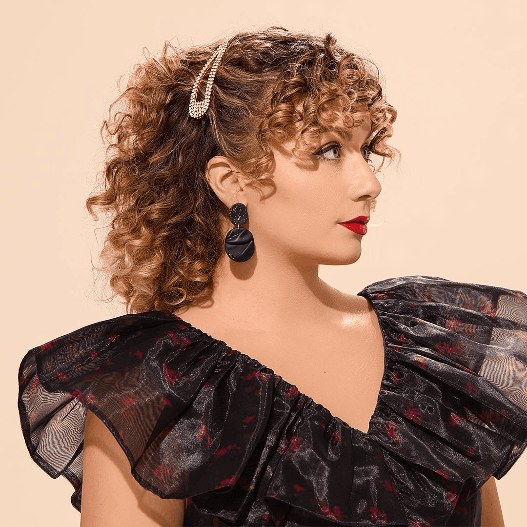 Elegant Side-Swept Curls