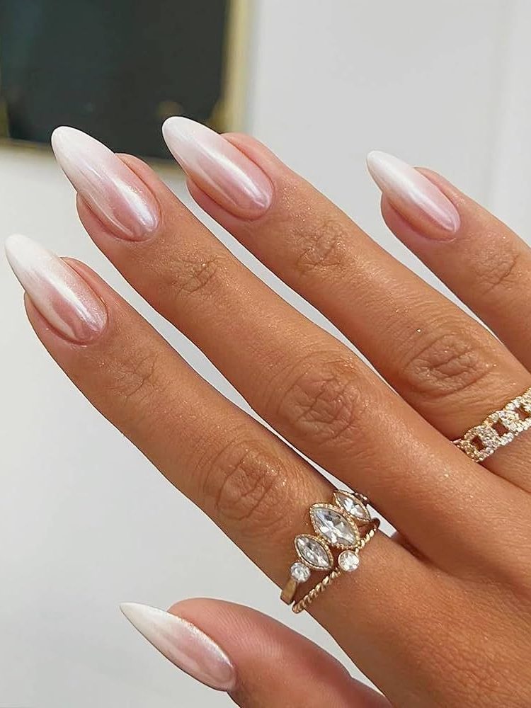 Chrome completes French ombre nails with almond shape