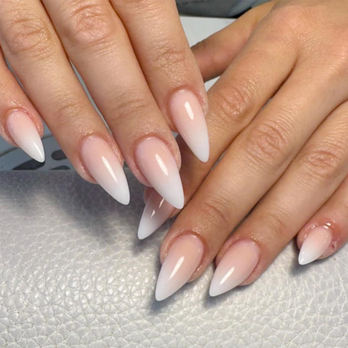 Chrome completes French ombre nails with almond shape
