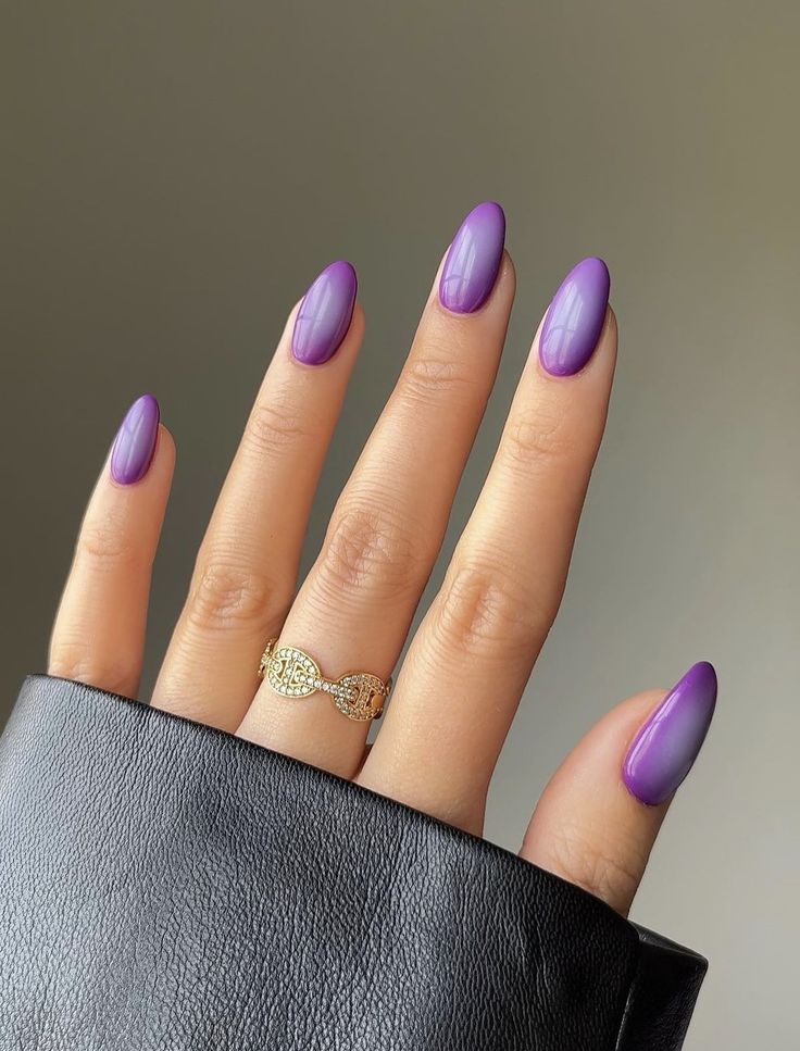 Polished dark purple ombre nails