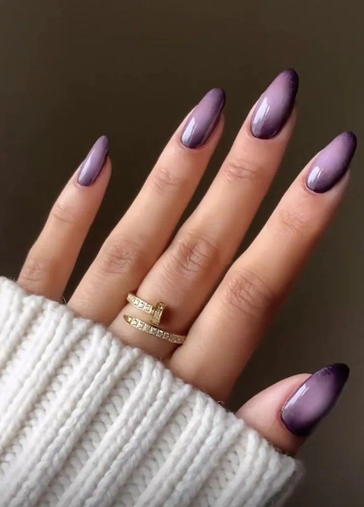 Polished dark purple ombre nails
