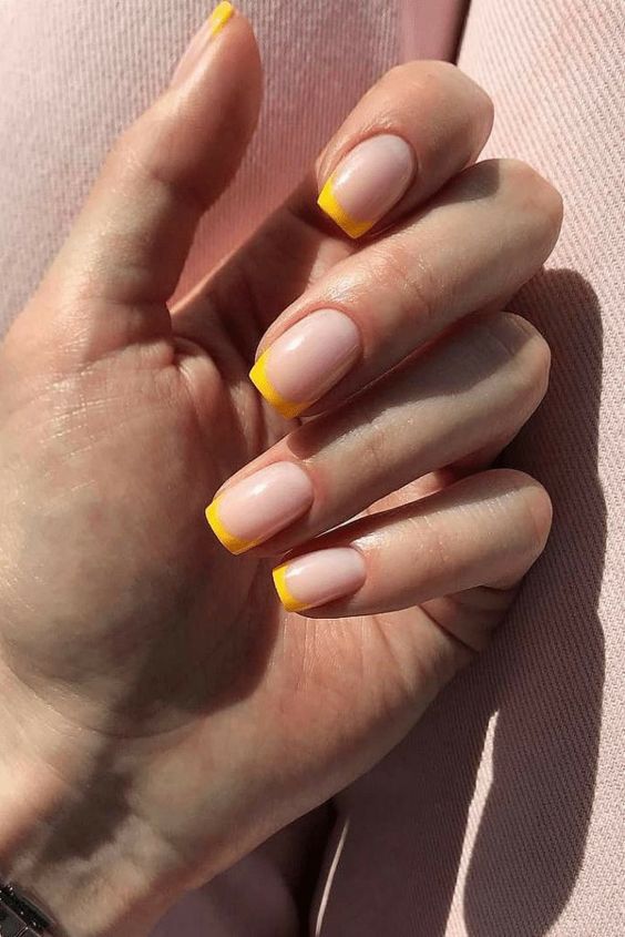 Nail manicure yellow French leaders