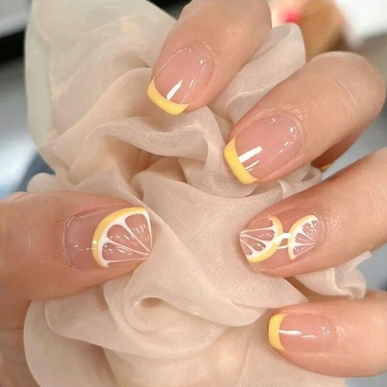 Nail design lemon accent with French tip