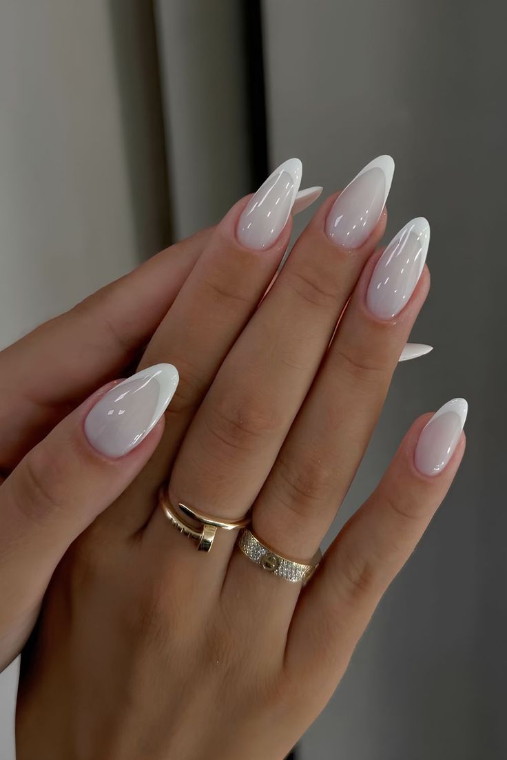 Classic white French nail on almonds