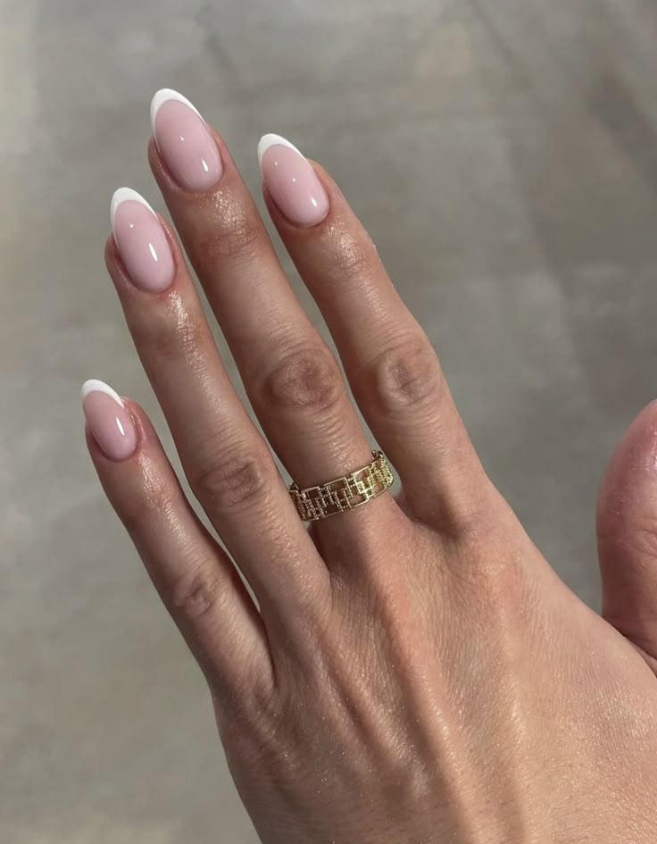 Classic white French nail on almonds
