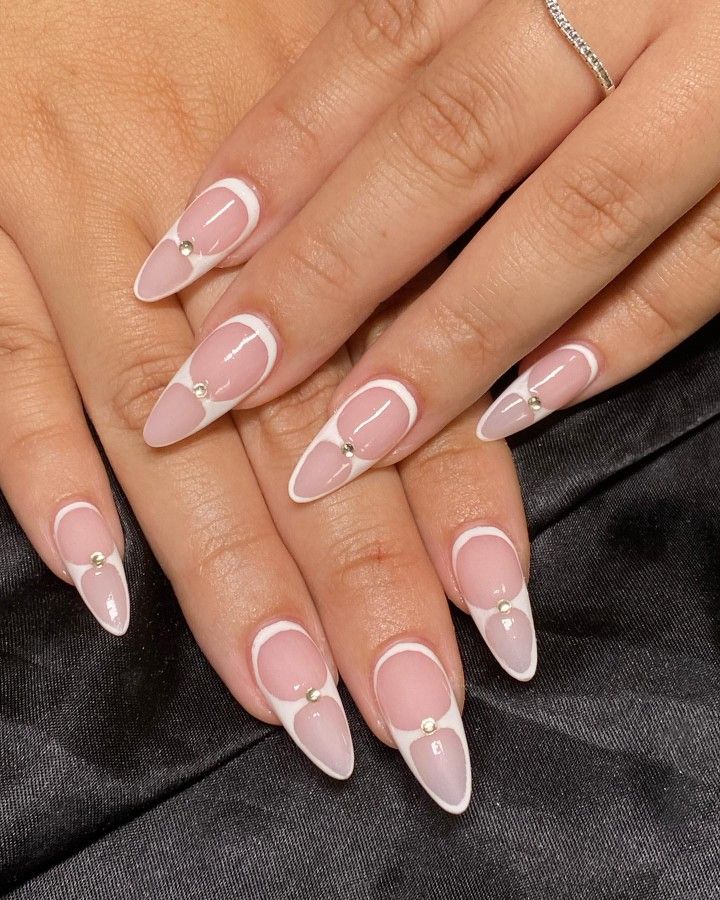 White framed French manicure with gems nails