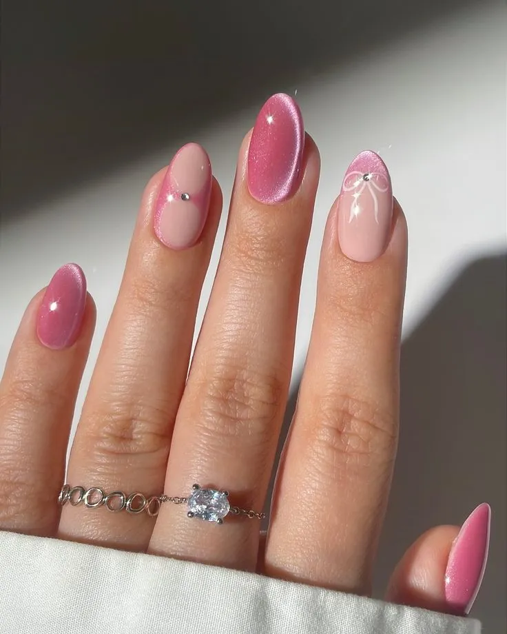 Strawberry Almond Cat Eye nails with bows