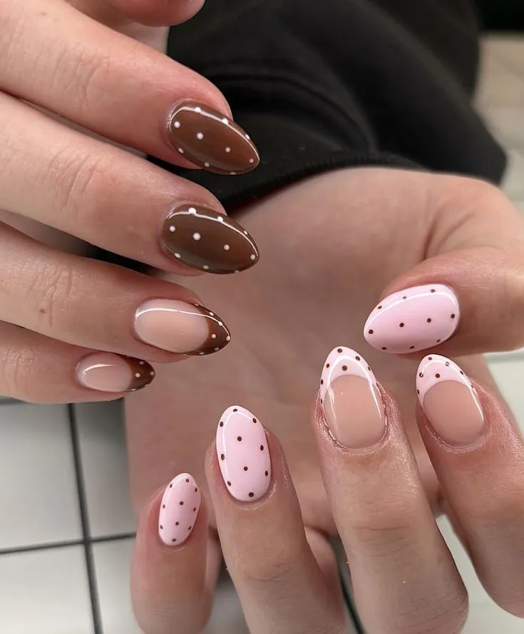 Chocolate nails and pink French tips with pink spot June nails