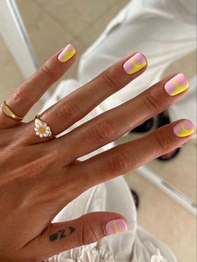 yellow and pink pastel geometric nails
