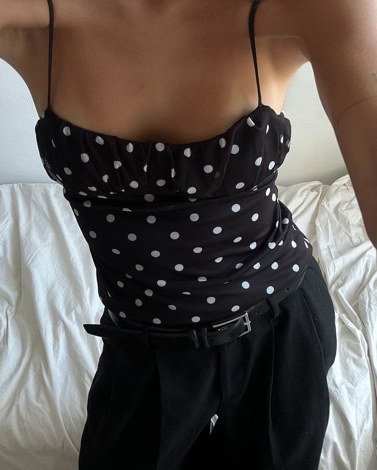 Polka dot cami top with black trousers