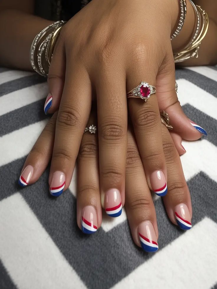 Striped French tips with red white and blue nails 4 July
