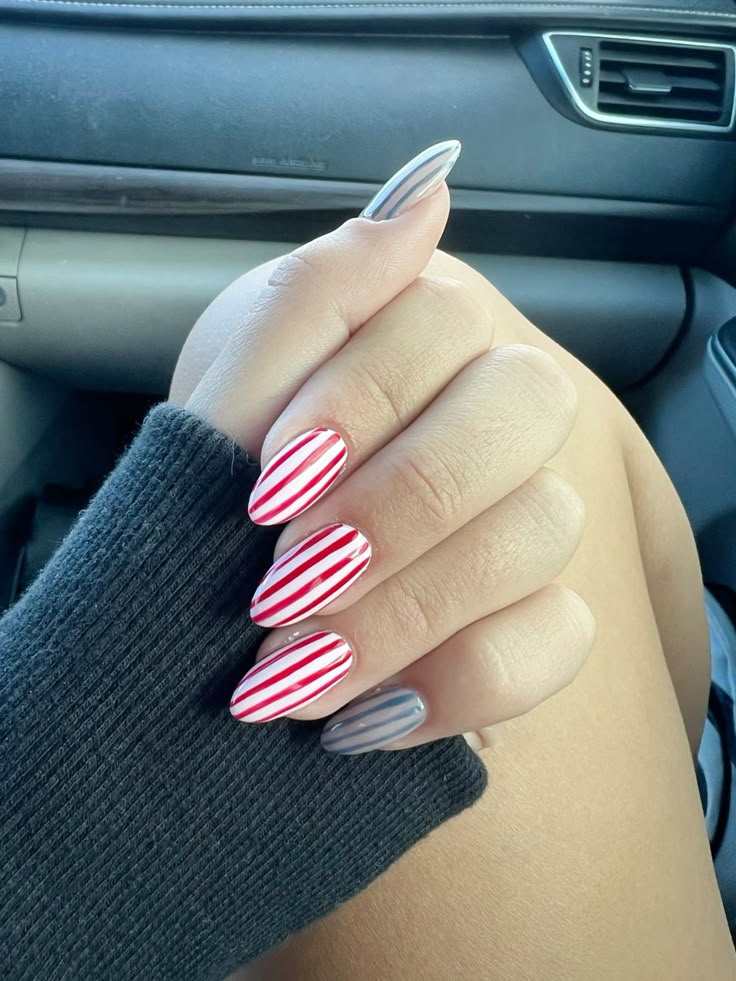 Striped red and blue 4th July nails
