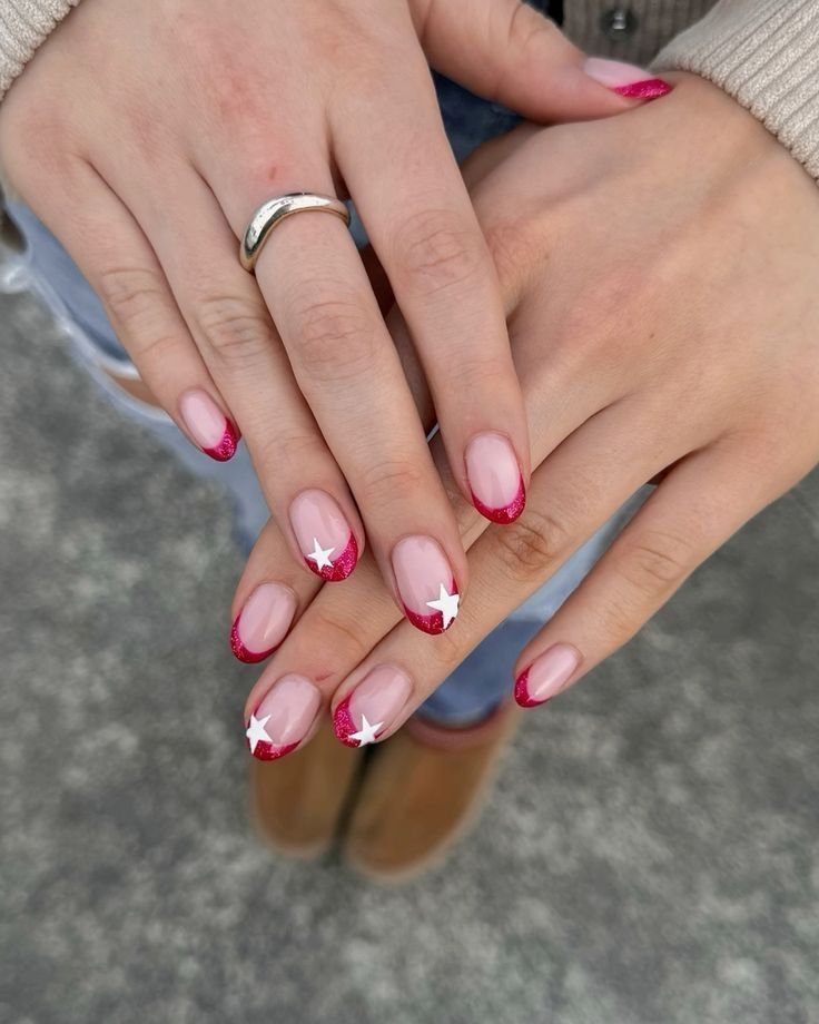 Red French tips with stars from July nails