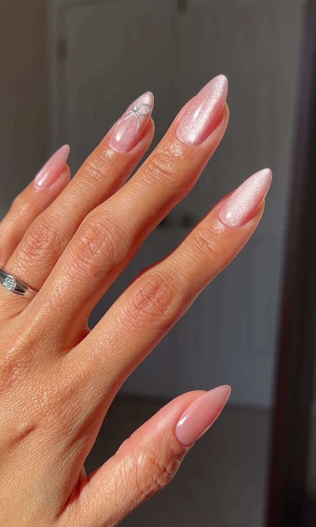 Coral pink eye nails with bows