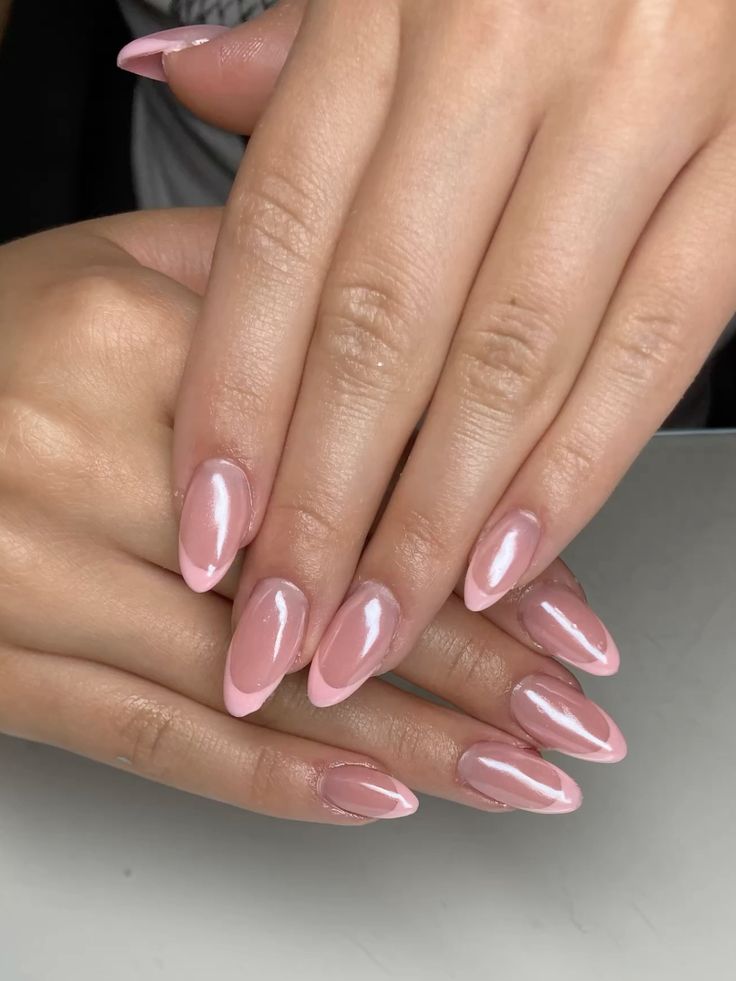 Pink chrome French nails with chrome finish
