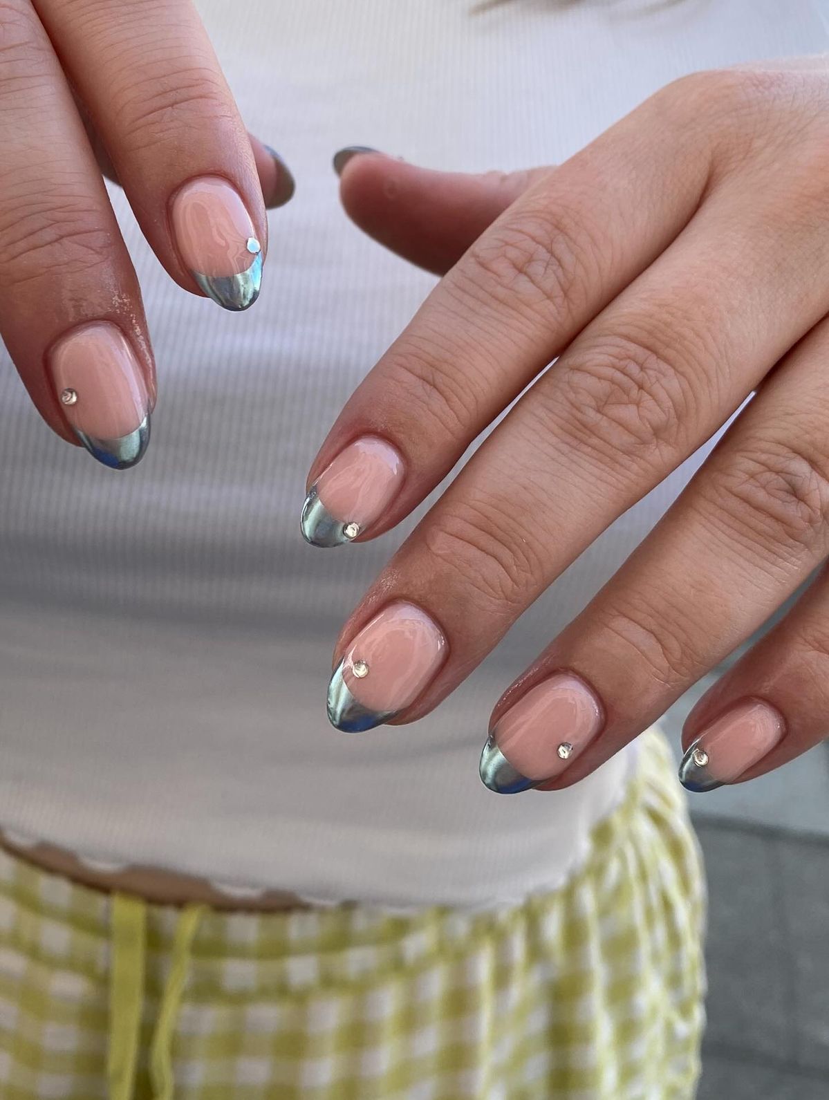 aqua metallic french manicure with jewel design
