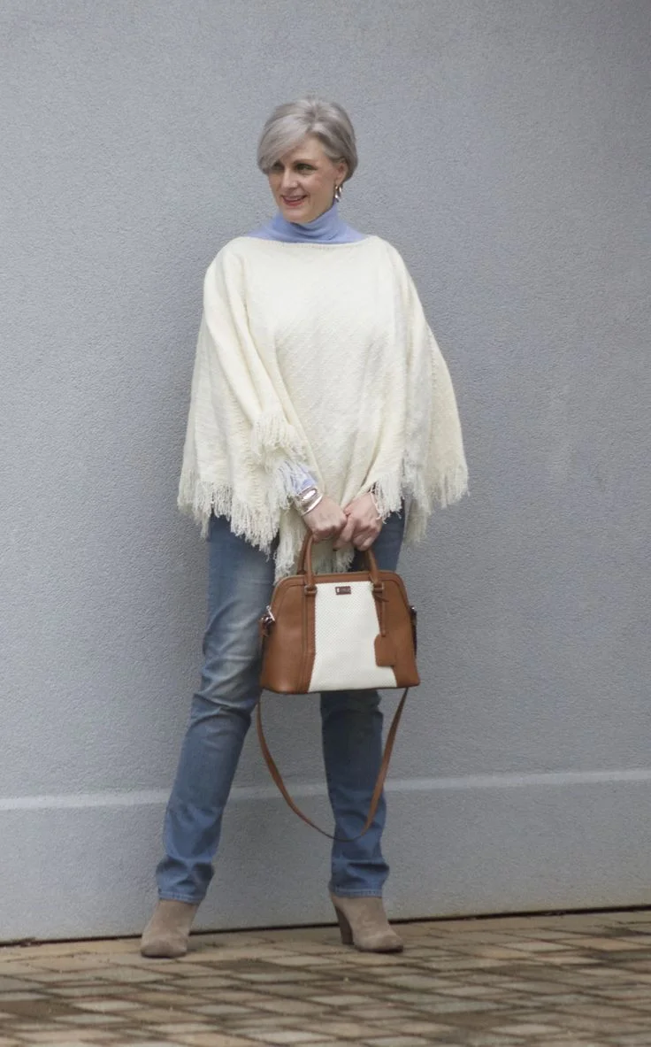 Embrace ageless style with confidence after 40. Trends may evolve, but true style remains timeless. Under the gray skies, let your elegance shine through.